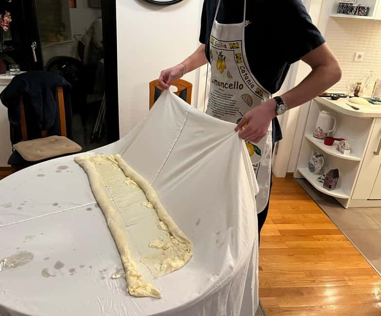Experience Sarajevo: Bosnian Cooking Class - Eating together with wine, rakija, and leftovers
