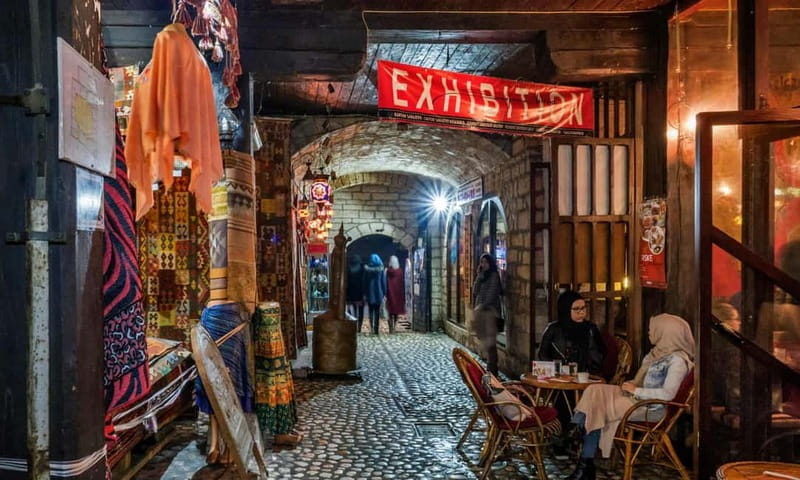 Sarajevo: Nighttime City Highlights Walking Tour - From Franz Ferdinand to the Latin Bridge